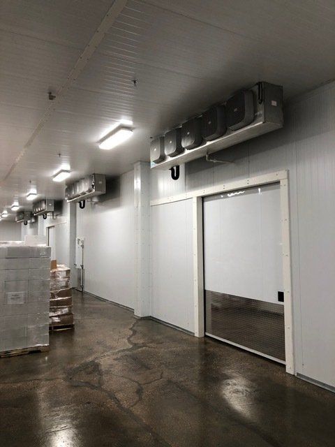 A large room with a sliding door in the middle of it