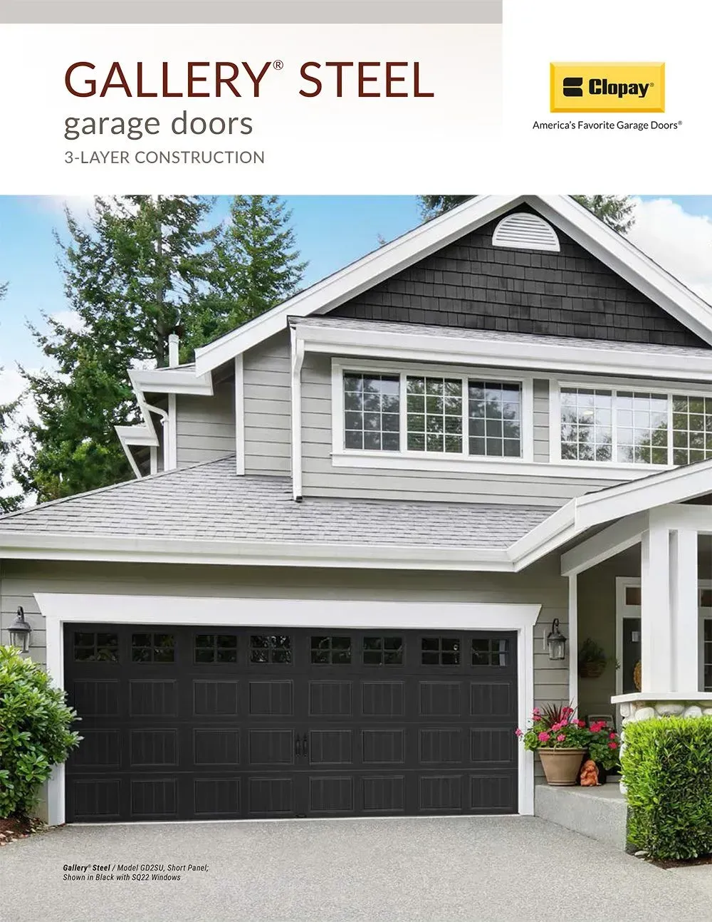 Modern gray house with dark garage doors and promotional text for steel garage doors
