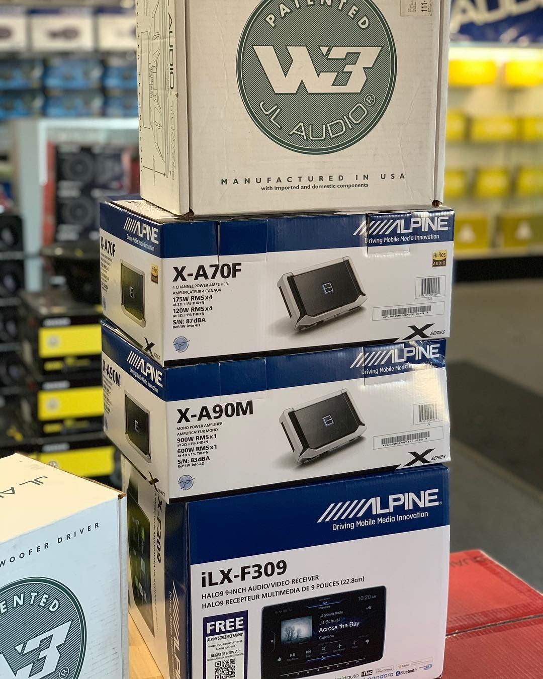 A stack of alpine boxes sitting on top of each other in a store.