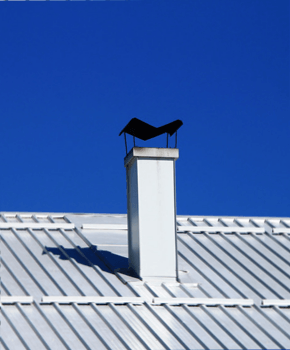 White aluminum roof with chimney