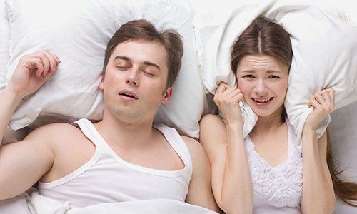 Learn More About Sleep Disorder Man snoring loudly