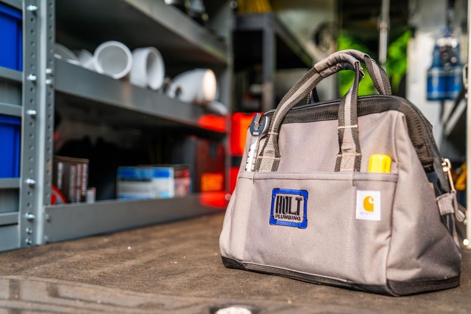 A Holt Plumbing Company LLC's assistant technician's bag
