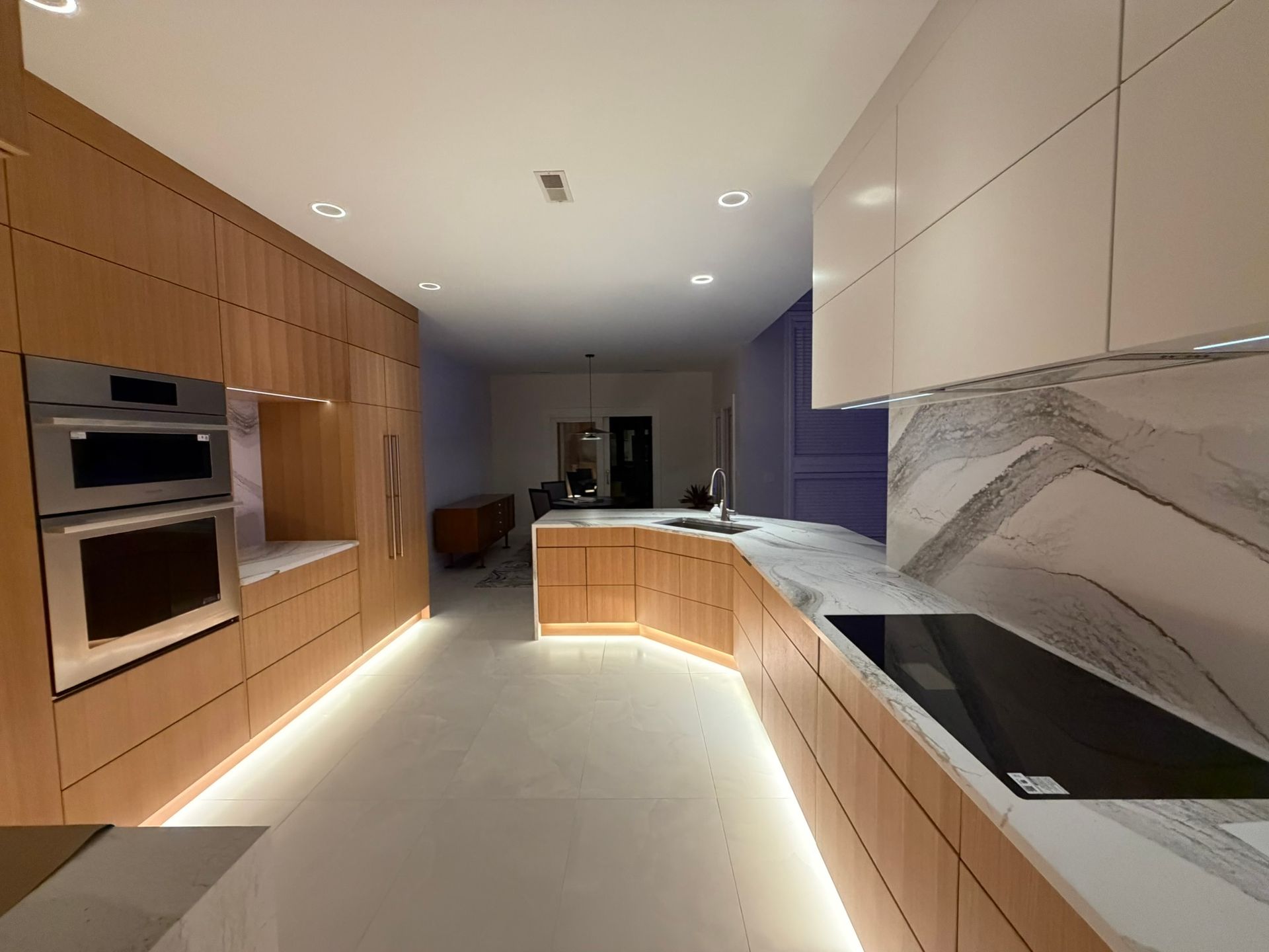 Modern minimalist kitchen with wood cabinets
