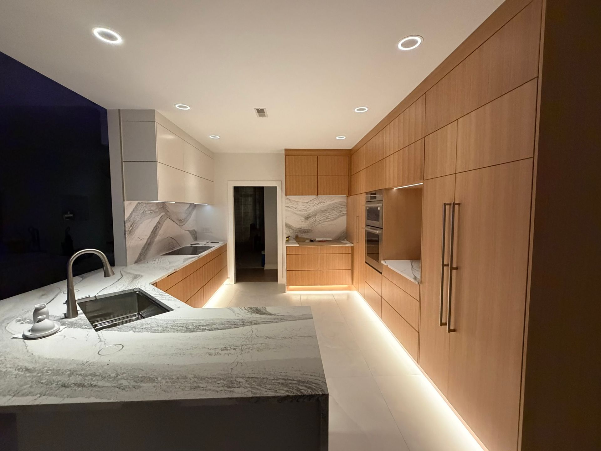 Modern minimalist kitchen with wood cabinets