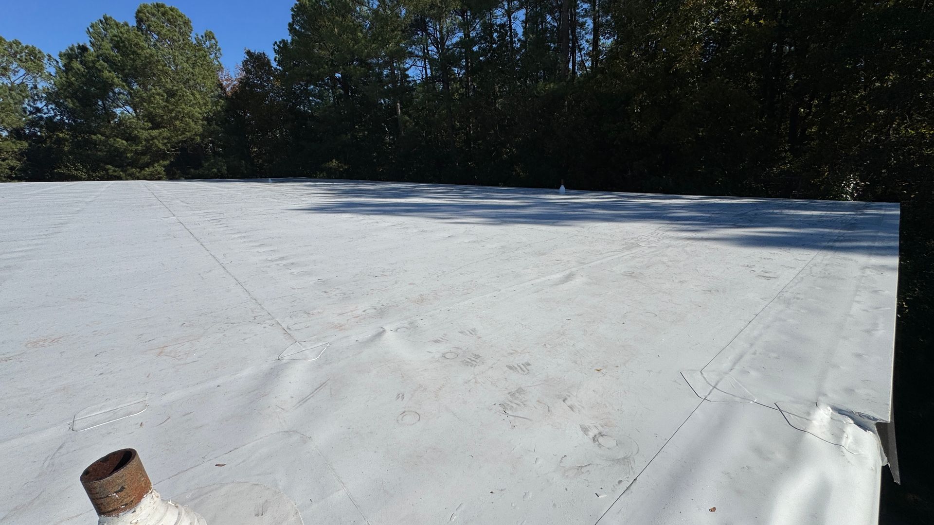 White metal roof surface.
