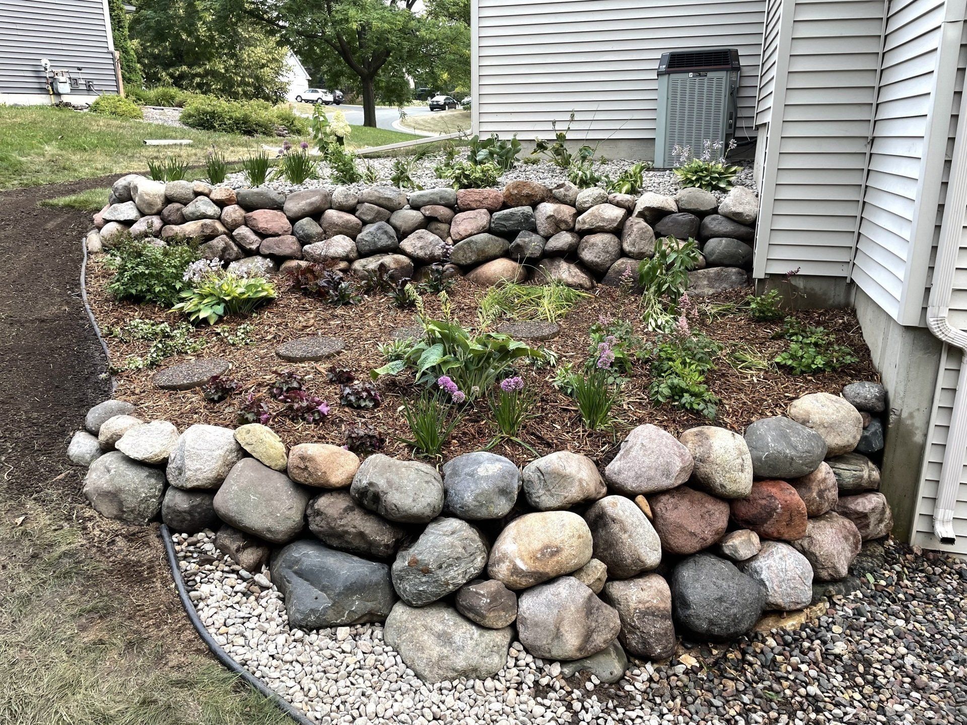 retaining wall at the side of the house