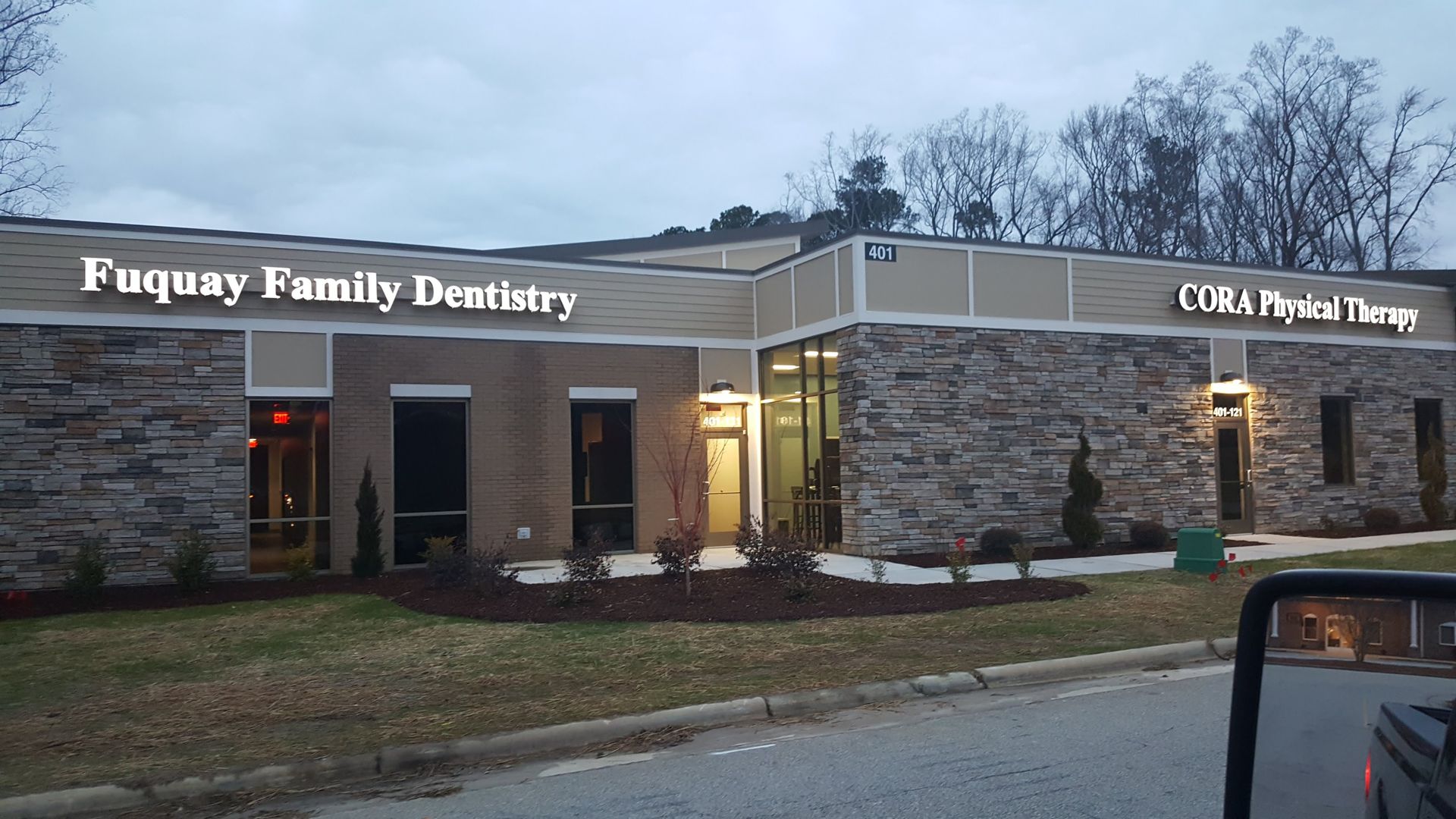 brown commercial building with Bradley Built, Inc signage in front