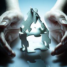 House shape made of puzzle pieces