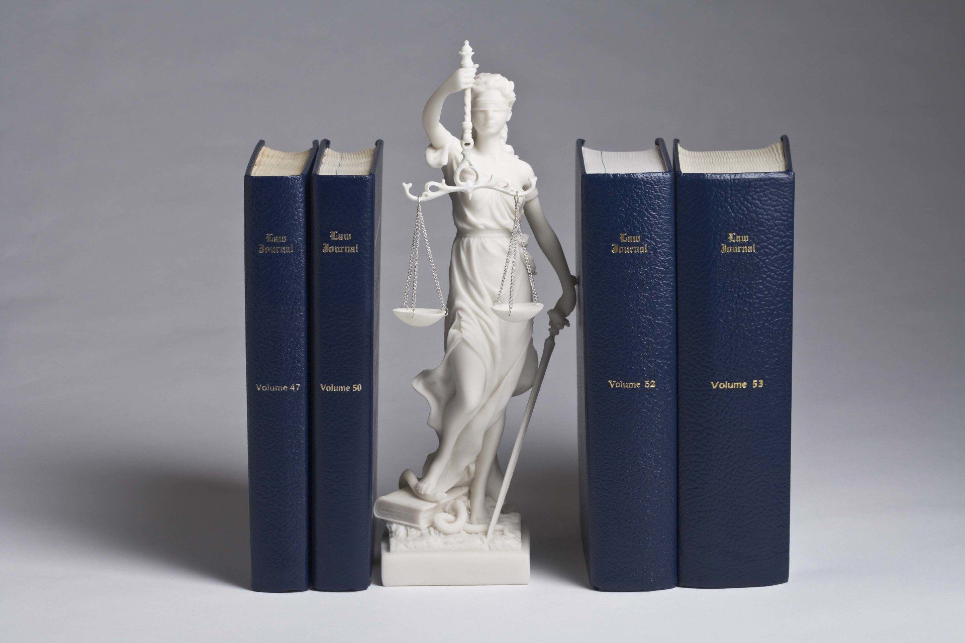 Legal books and lady justice