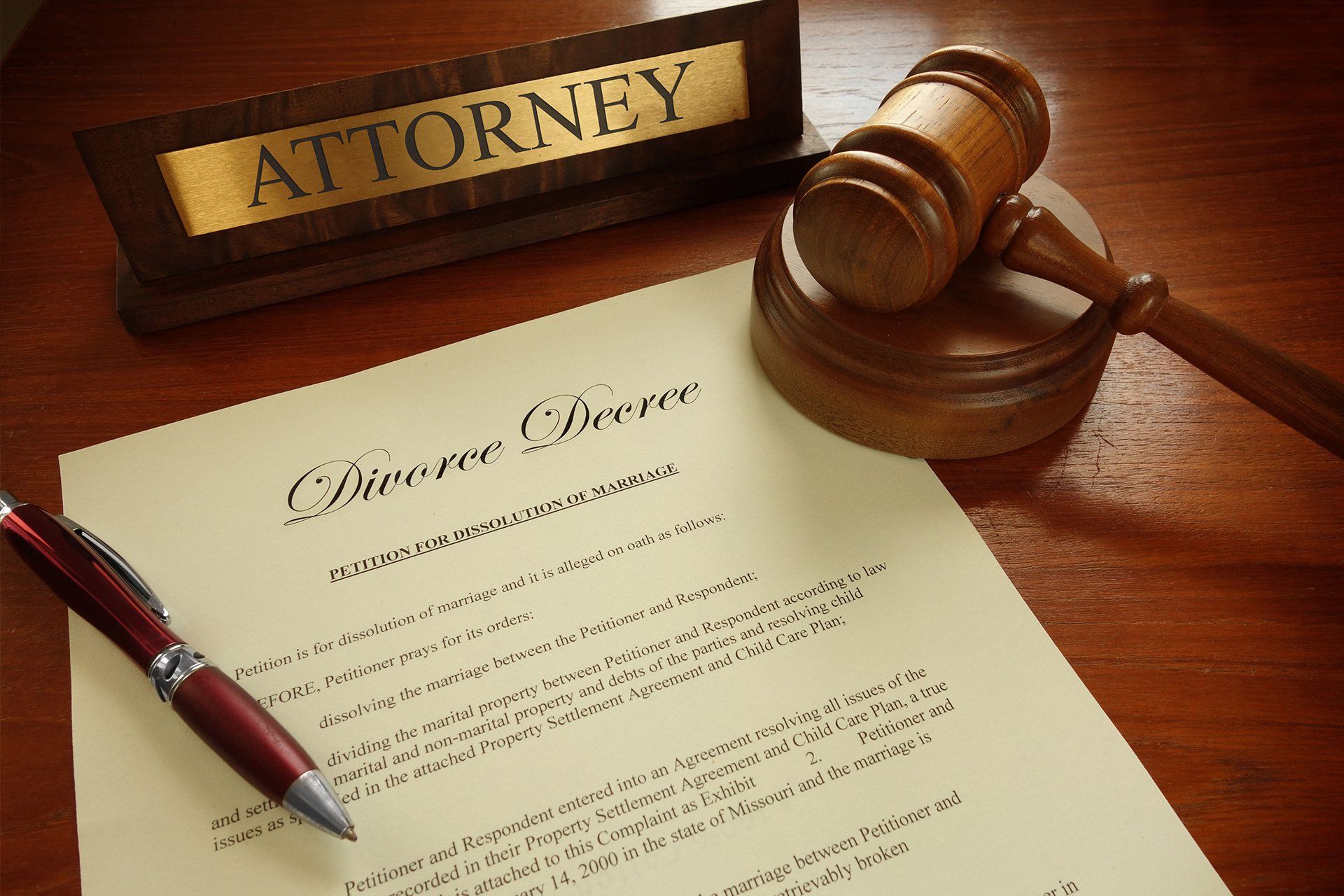 Divorce Decree with gavel and Attorney nameplate