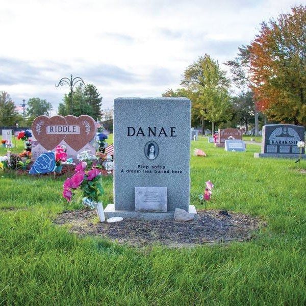 Gravestone in a cemetery, engraved 