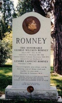 Grave of George W. Romney, with a bronze profile. Inscription includes dates and positions.