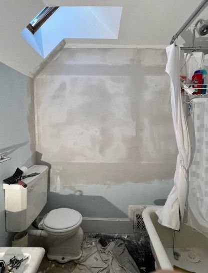 after photo of a bathroom wall