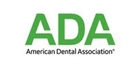 ADA logo with green letters and the words “American Dental Association” underneath