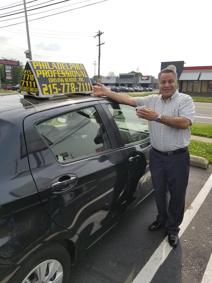 Man holding driver's license