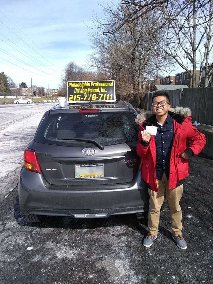 Happy teen successfully passed driving school test