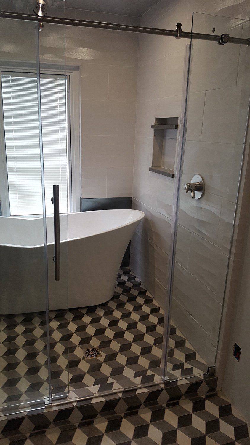 bathroom with ceramic tiles as floors and walls