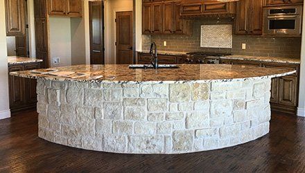 granite countertop with stacked stone as legs