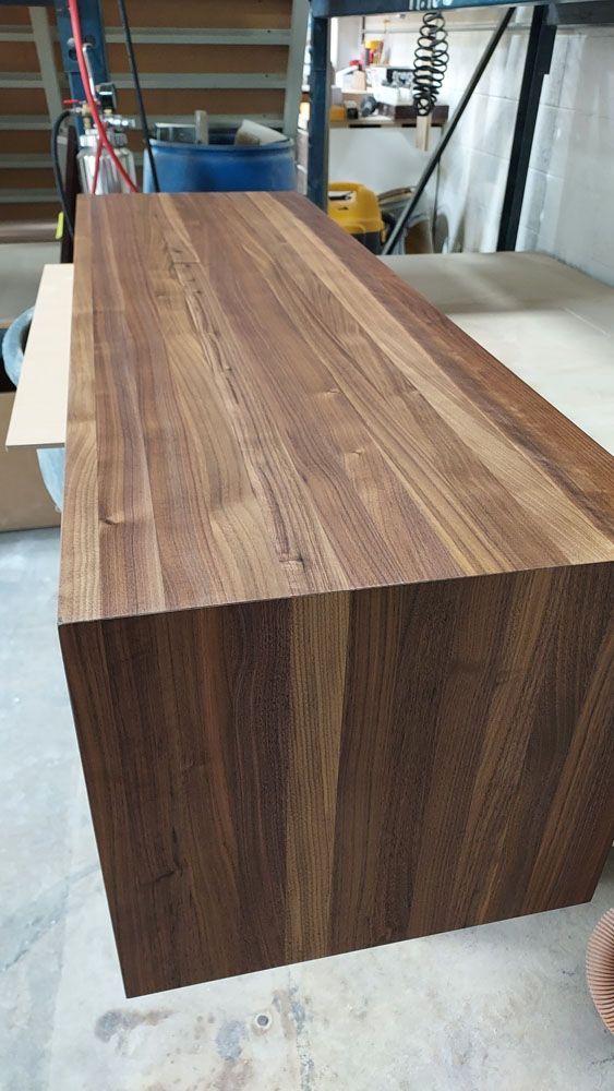 A large piece of wood is sitting on top of a table