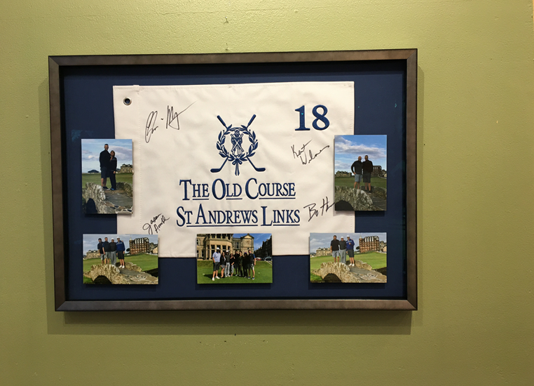 A framed sign for the old course st andrews links