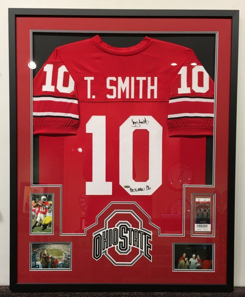 A framed jersey with the number 10 on it