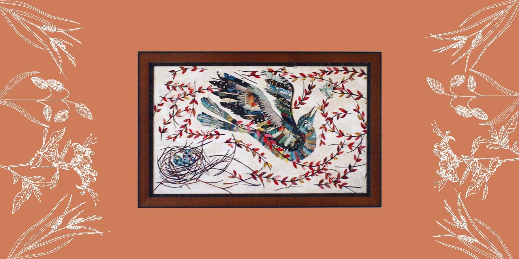 A cross stitch painting of a bird is hanging on a wall.