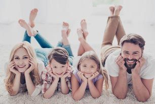 Family on a carpet floor