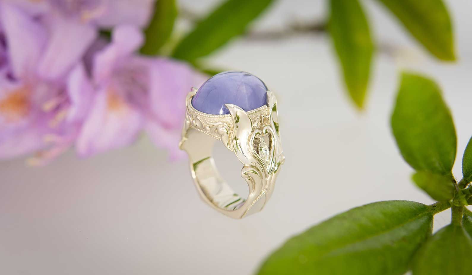 A ring with a periwinkle stone