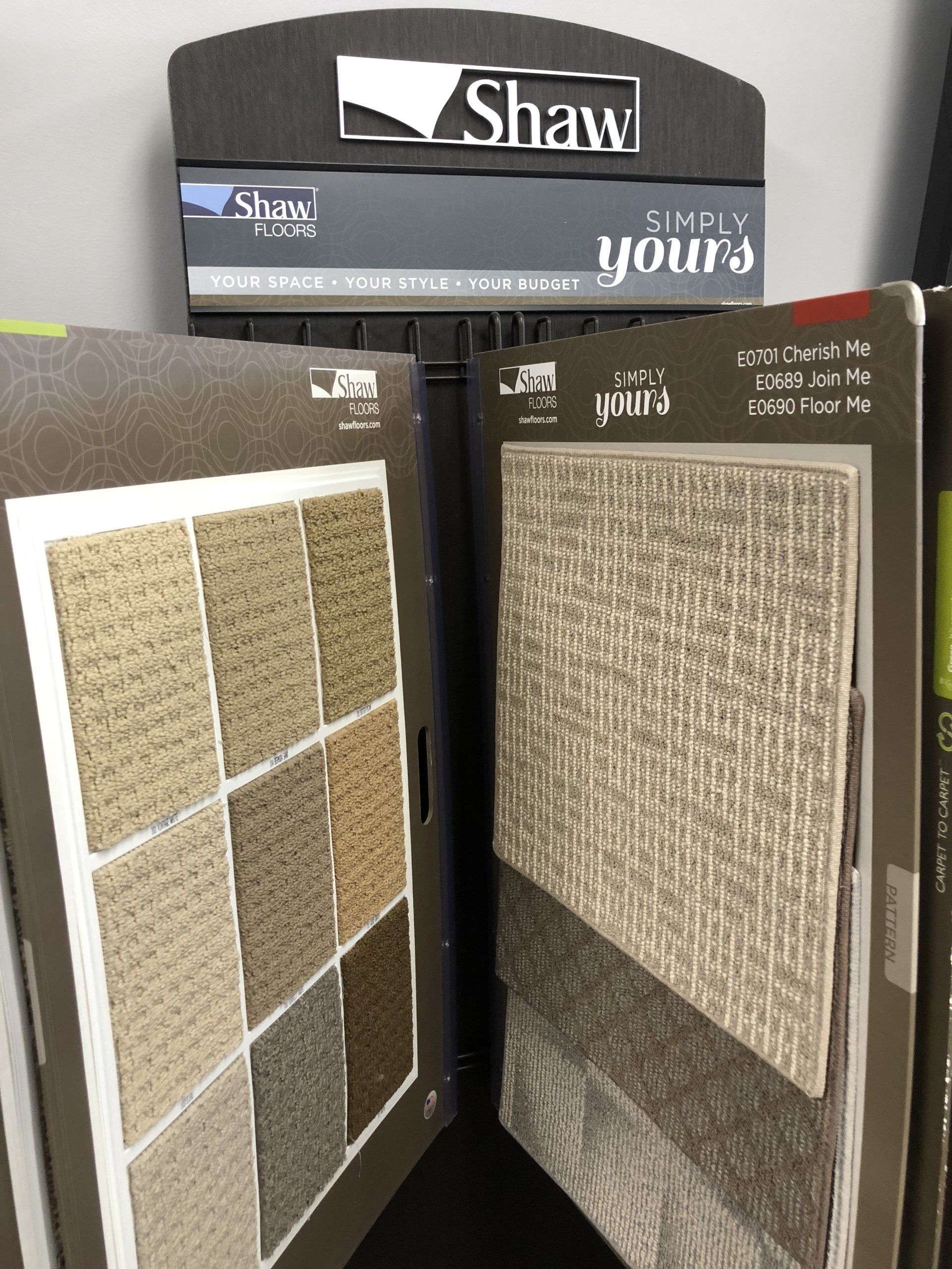 A display of shaw simply yours carpet samples