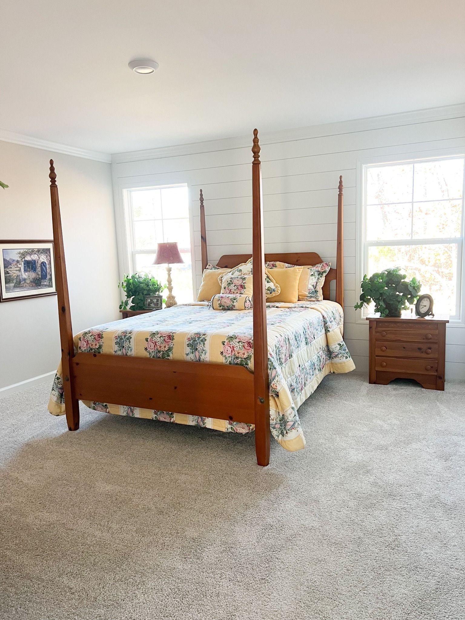 There is a four poster bed in the middle of the room.