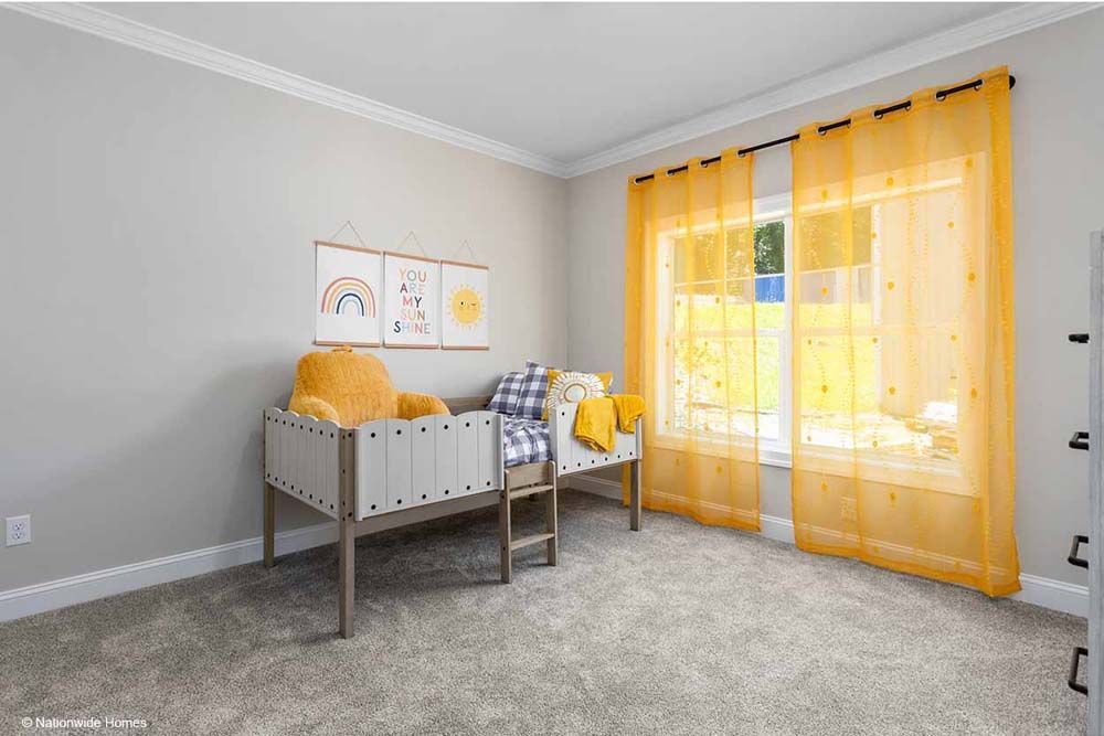 A bedroom with a bunk bed and yellow curtains.