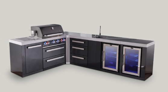Black and stainless outdoor kitchen with grill, cabinets, countertop, and two beverage fridges