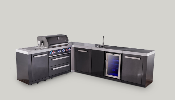 Black outdoor kitchen grill and cabinets with stainless steel appliances on a gray background