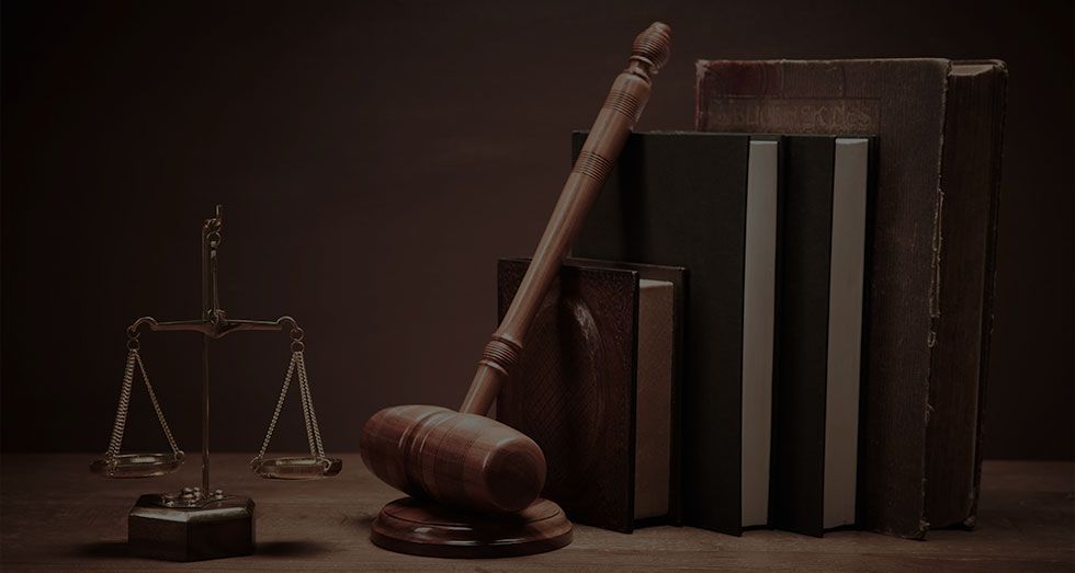Law scale, gavel and books