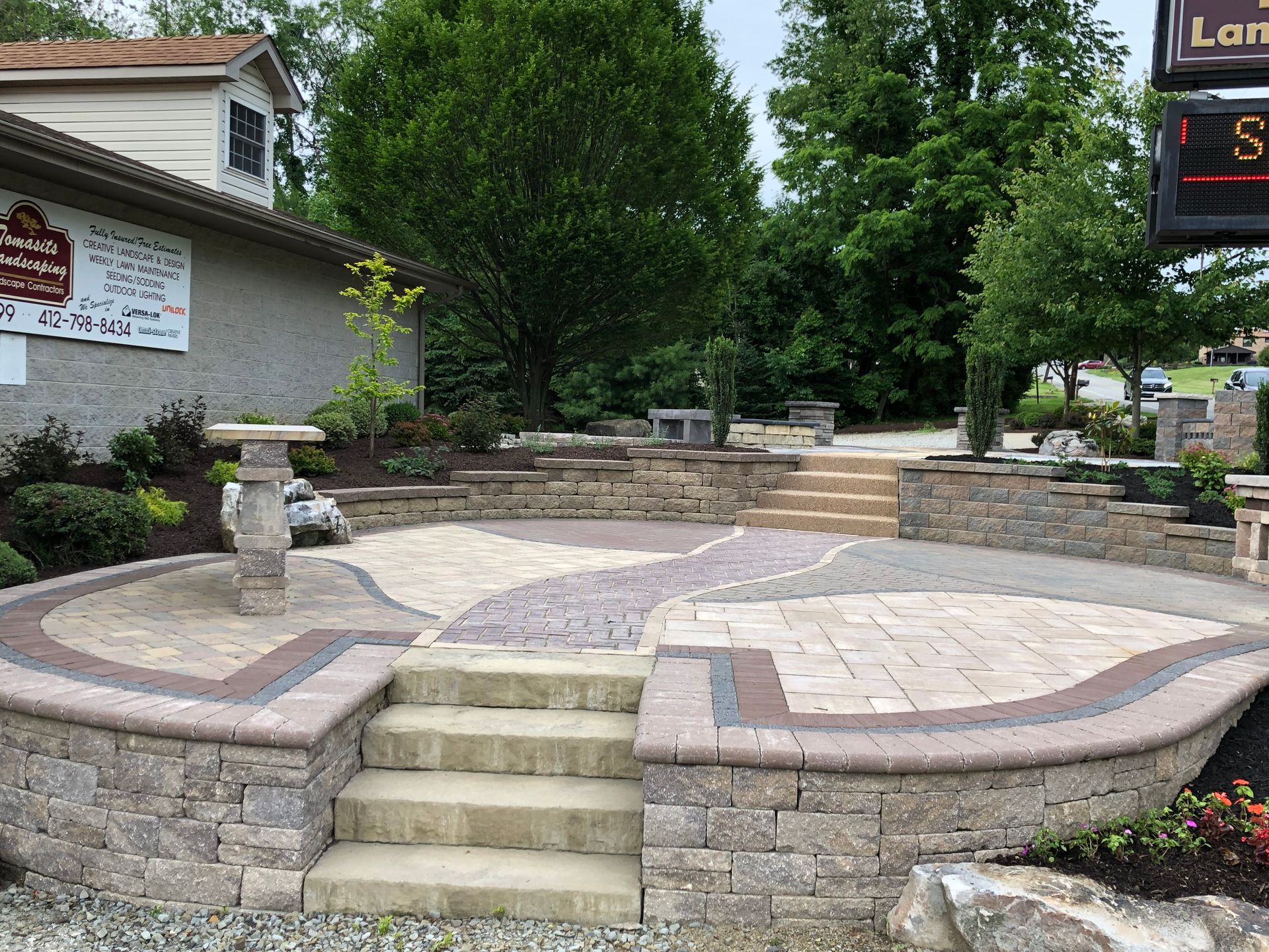 A patio with stairs and a sign that says landmark
