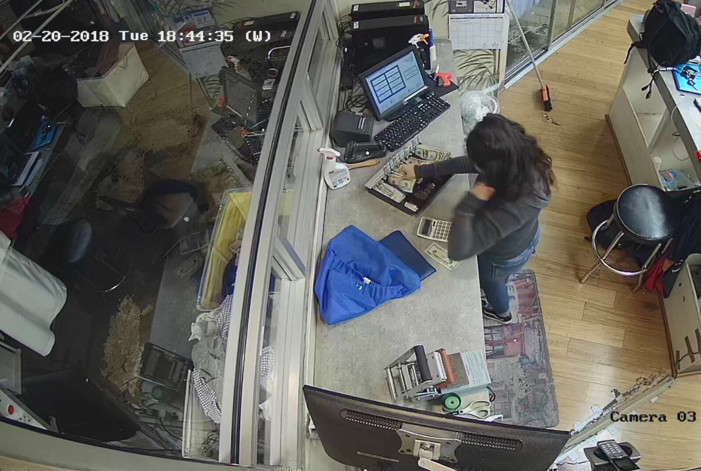 A person works on a cashier