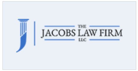 Logo for The Jacobs Law Firm LLC with blue column icon and dark gray text on a light background