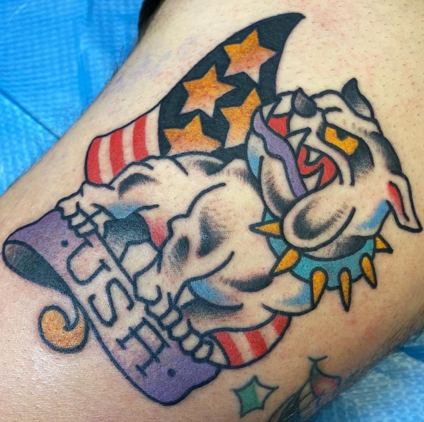 a tattoo of a dog with the word usa on it