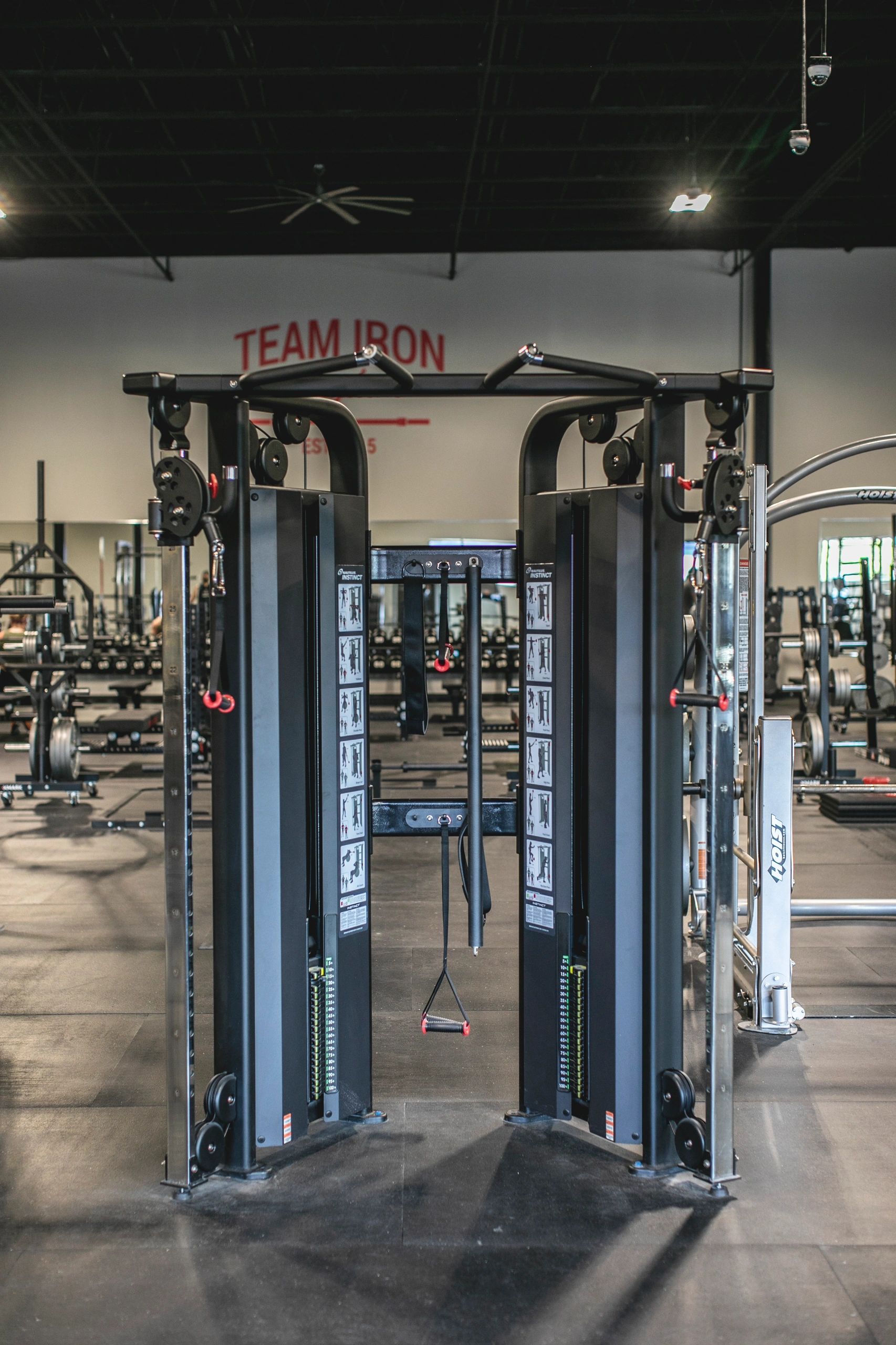 A gym with a sign that says team iron on it