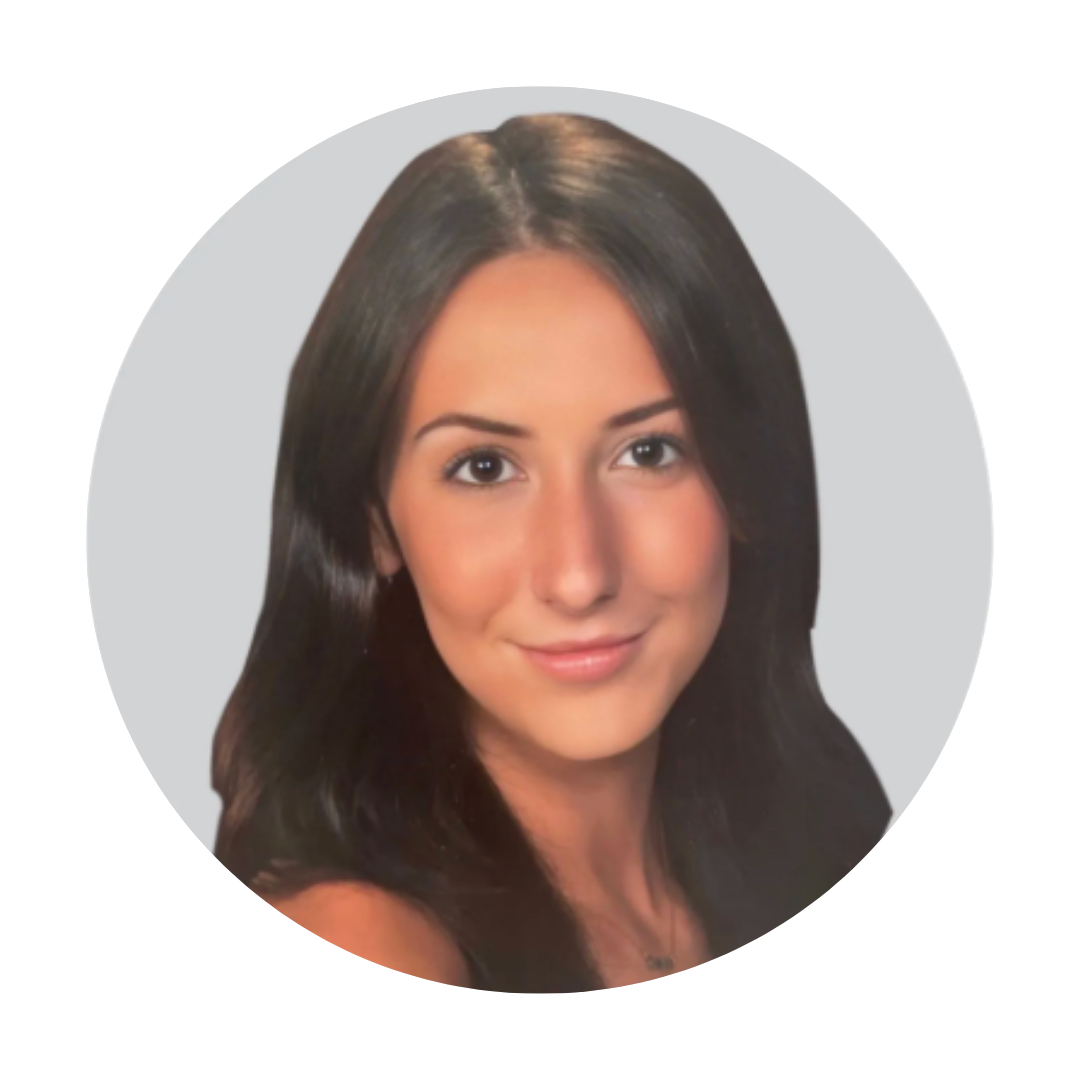 Cartoon camera with big eyes and rosy cheeks within a gray circle.