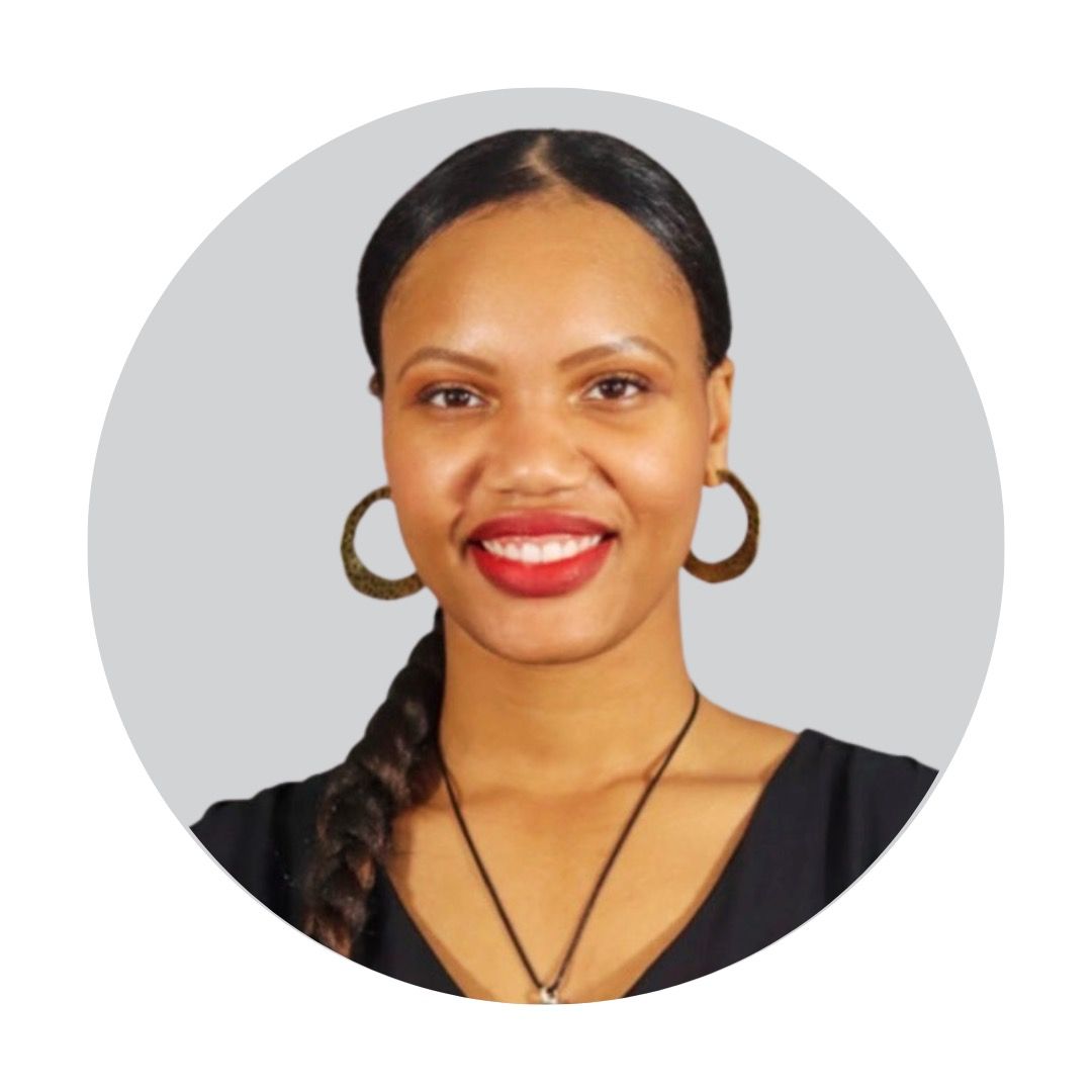 Cartoon camera with big eyes and rosy cheeks within a gray circle.