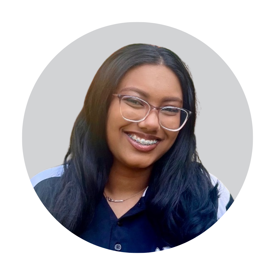 Cartoon camera with big eyes and rosy cheeks within a gray circle.