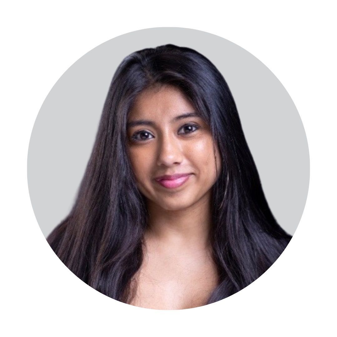 Cartoon camera with big eyes and rosy cheeks within a gray circle.