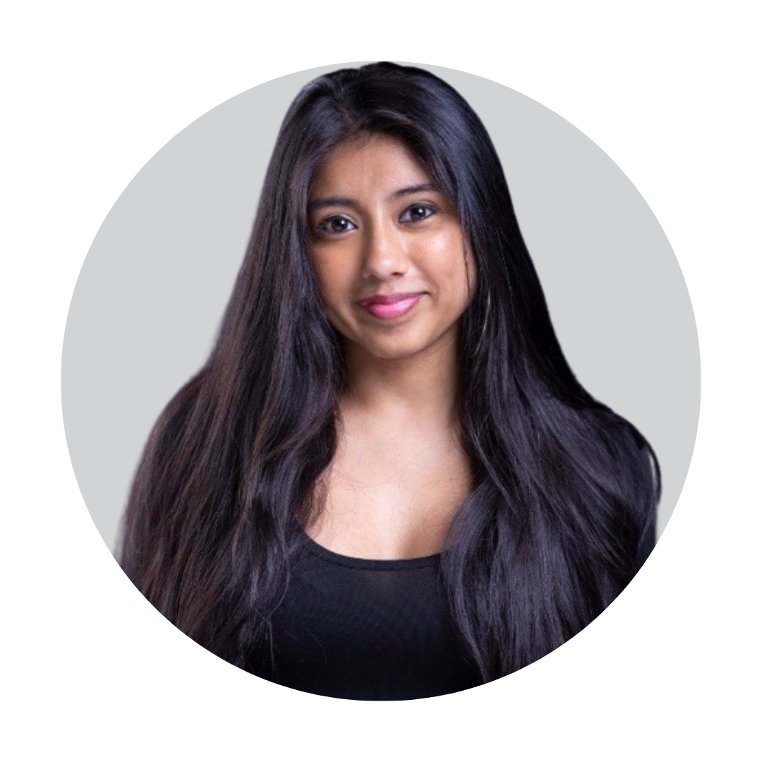 Cartoon camera with big eyes and rosy cheeks within a gray circle.