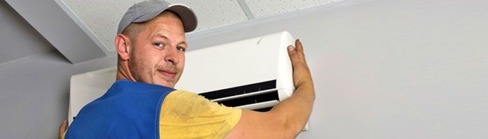 Man installing AC
