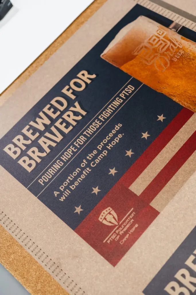 Brewed for bravery beer can label in red, white, and blue with a patriotic design