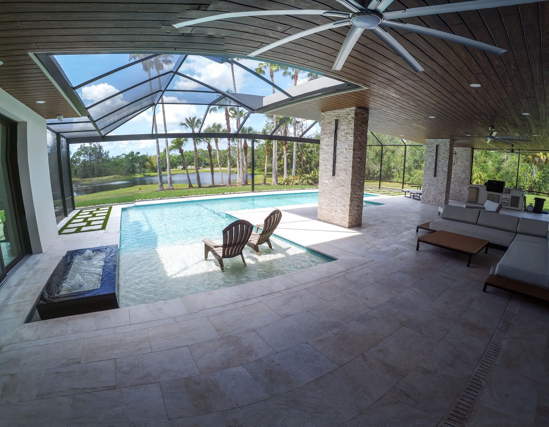 There is a large swimming pool in the middle of the house.