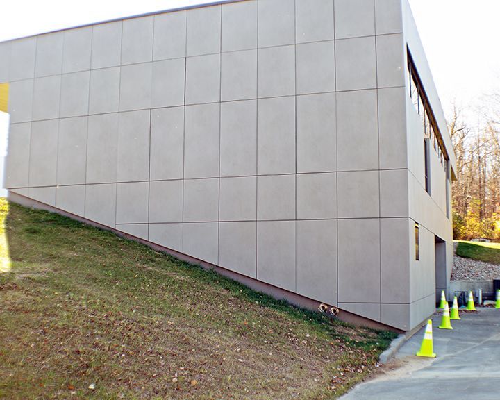 A building with a steep slope on the side of it