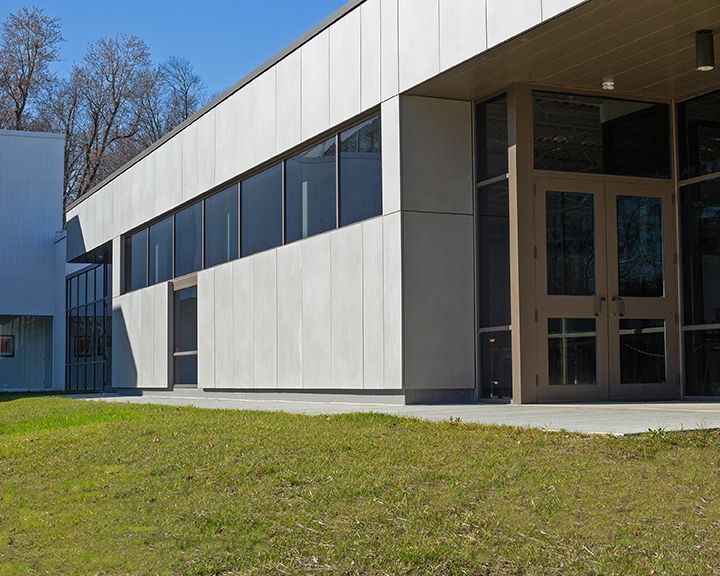 A large building with a lot of windows and doors