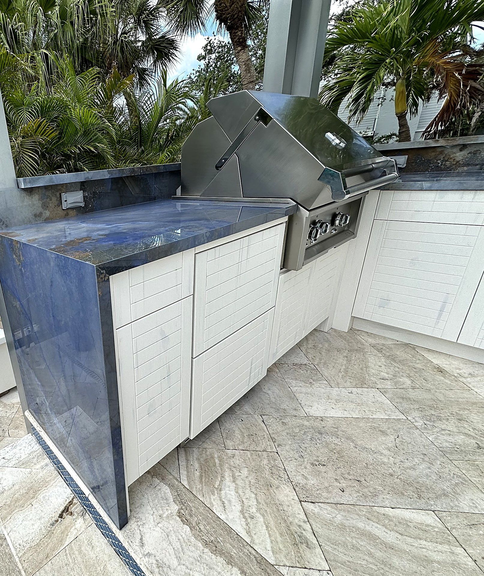 Counter with a mitered waterfall end to the floor